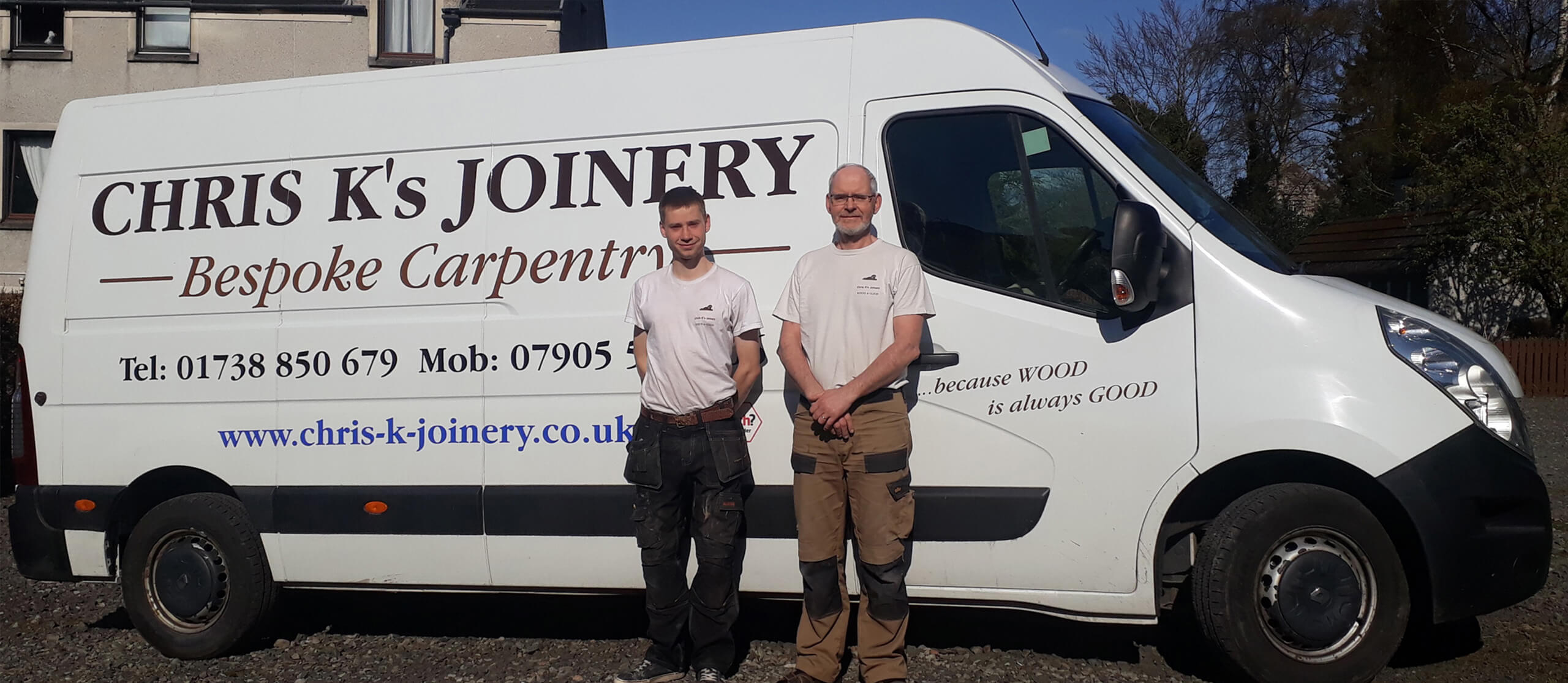 Two men, both skilled in joinery, stand proudly in front of a white van in Perth.